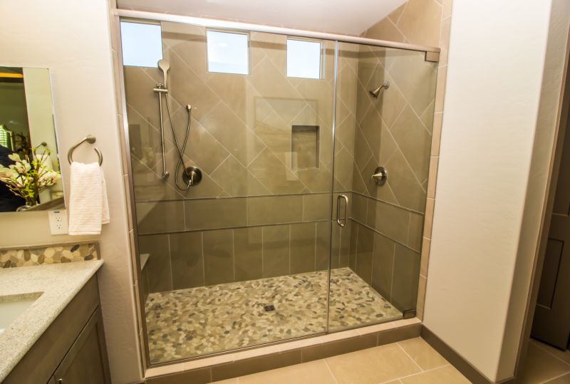 Elegant shower enclosure with frameless glass